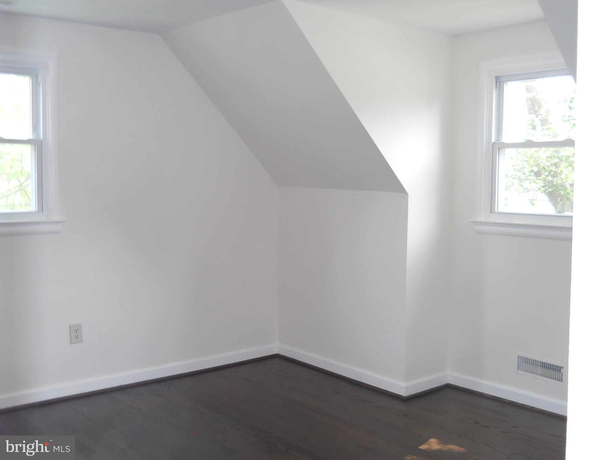 12607 Dean Road Silver Spring, MD 20906 - Photo 22 of 34 an empty room with a window