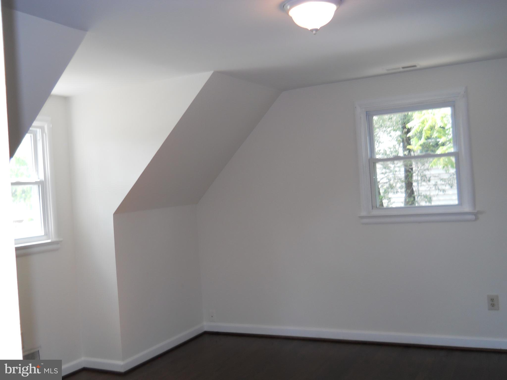 12607 Dean Road Silver Spring, MD 20906 - Photo 24 of 34 an empty room with a window