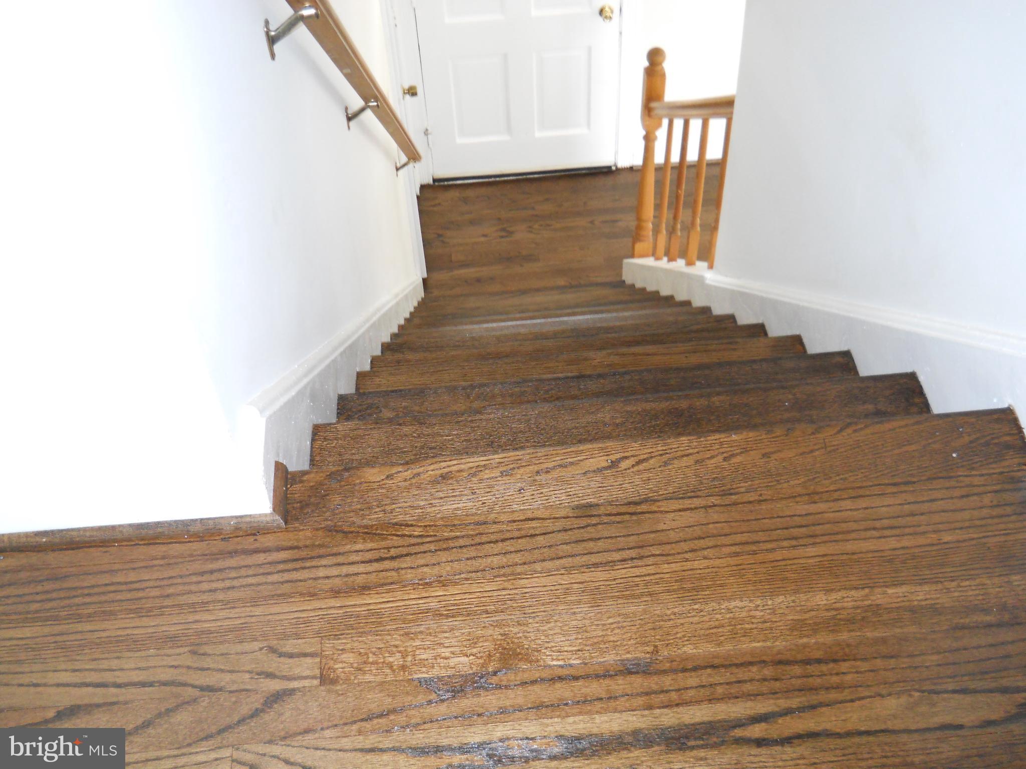 12607 Dean Road Silver Spring, MD 20906 - Photo 25 of 34 a view of entryway and hall with wooden floor