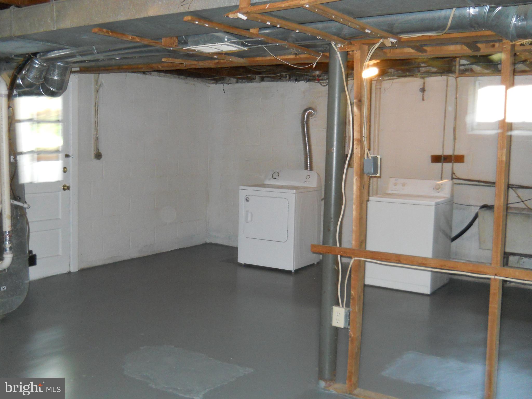 12607 Dean Road Silver Spring, MD 20906 - Photo 30 of 34 a view of storage and utility room