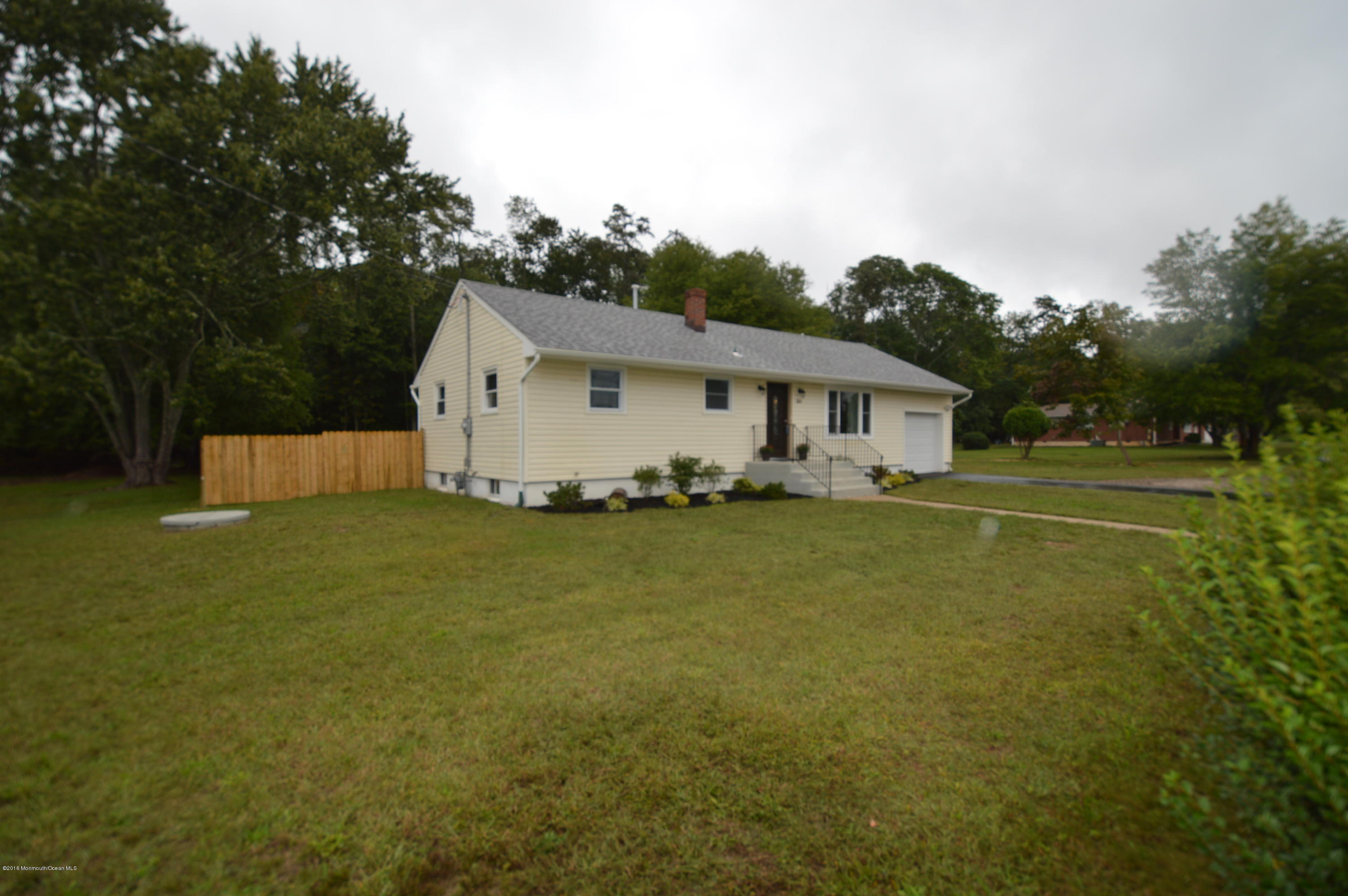 260 Adelphia Road Farmingdale, NJ 07727 - Photo 3 of 30 a view of a house with a yard