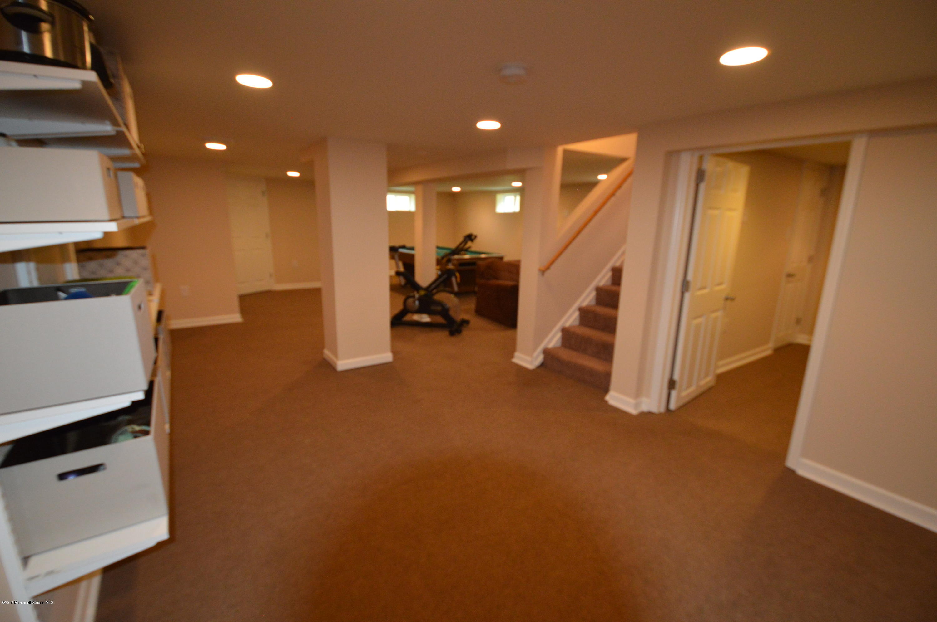 260 Adelphia Road Farmingdale, NJ 07727 - Photo 22 of 30 a view of an empty room with stairs