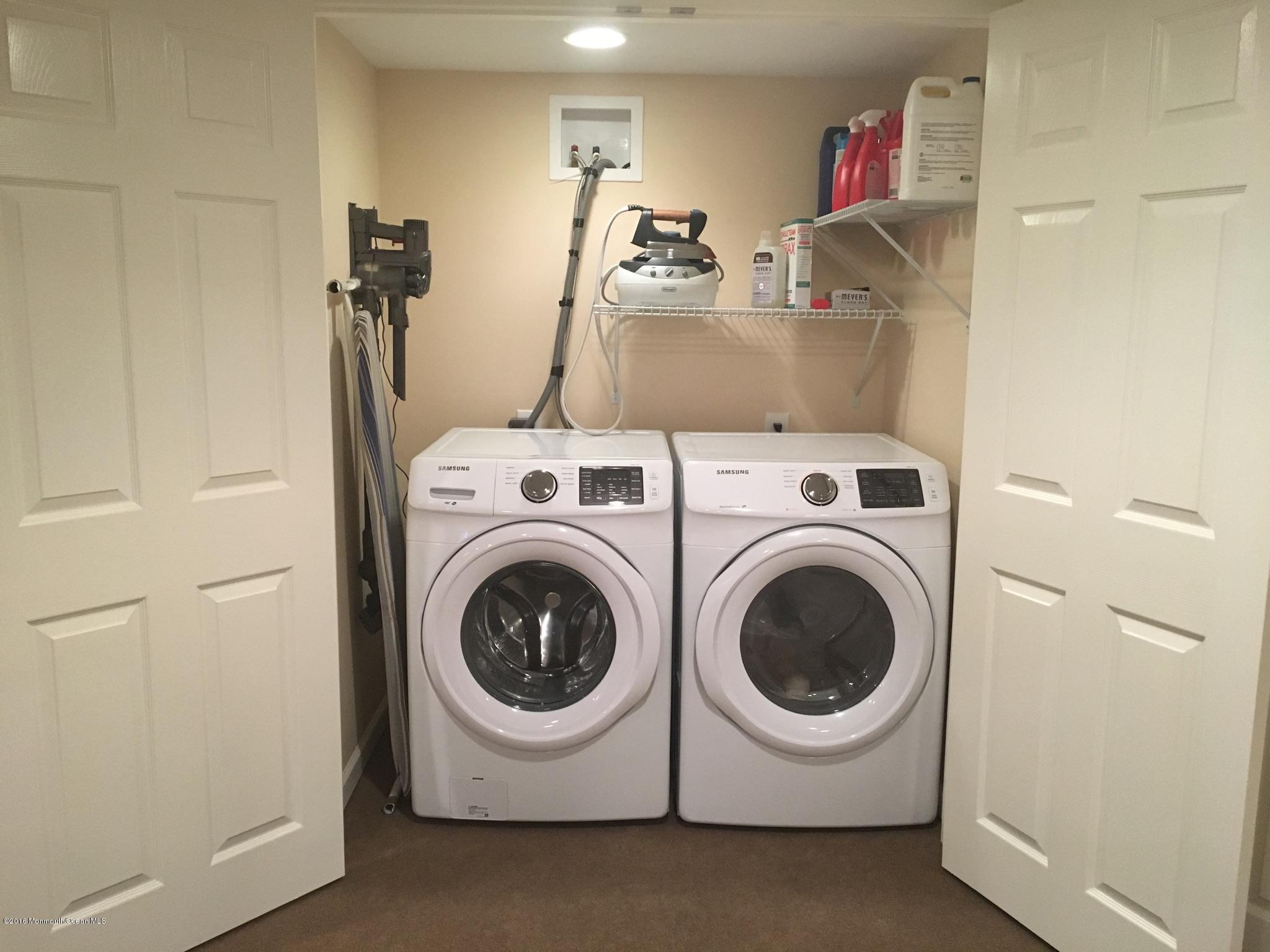 260 Adelphia Road Farmingdale, NJ 07727 - Photo 24 of 30 a utility room with dryer and washer