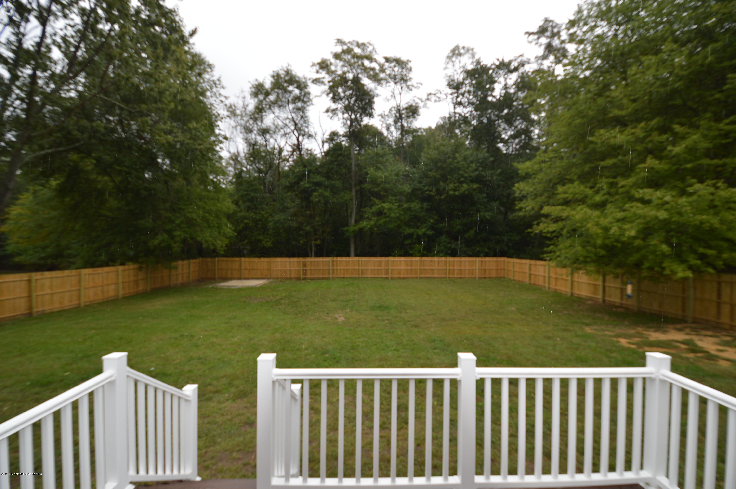 260 Adelphia Road Farmingdale, NJ 07727 - Photo 29 of 30 a view of a wooden deck and floor