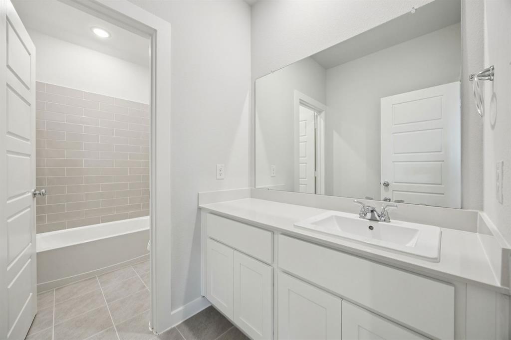 5803 Rushing River Way McKinney, TX 75071 - Photo 31 of 34 Bathroom in the Masters home plan by Trophy Signature Homes – REPRESENTATIVE PHOTO