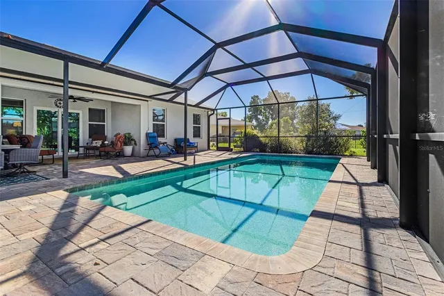 a view of yard with patio