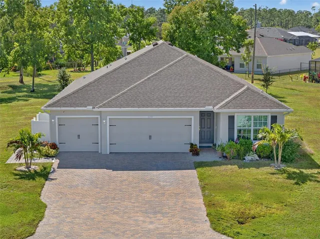 a house view with a garden space