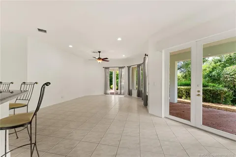 a bathroom with a granite countertop toilet a sink and bathtub