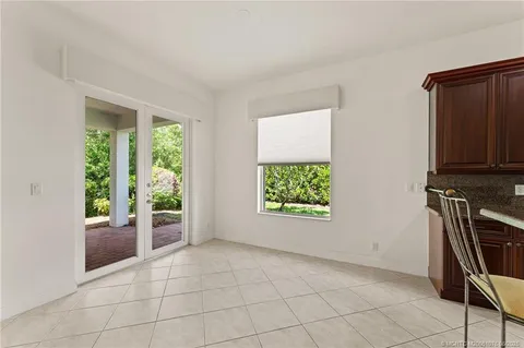 a utility room with sink dryer and washer