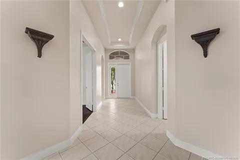 a view of empty room with a fireplace