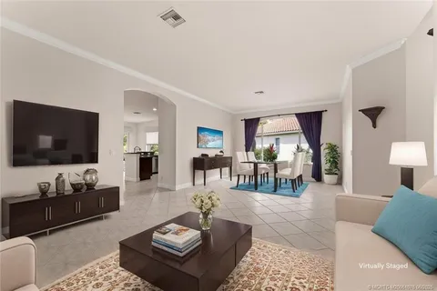 a view of a room with an empty space and a window