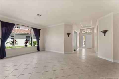 a view of a livingroom and a window