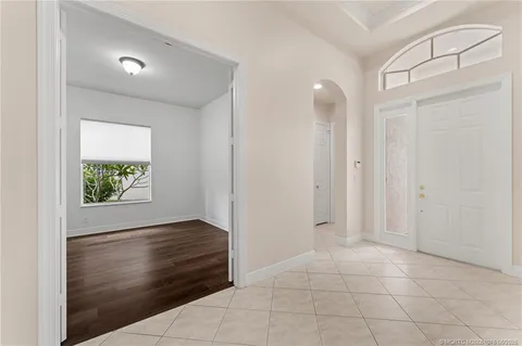 a kitchen with stainless steel appliances granite countertop sink stove and cabinets