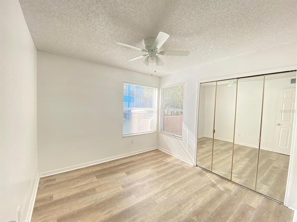 2751 North Poinciana Boulevard, Unit 27 Kissimmee, FL 34746 - Photo 12 of 18 a view of an empty room