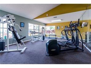 2751 North Poinciana Boulevard, Unit 27 Kissimmee, FL 34746 - Photo 16 of 18 a view of a room with gym equipment