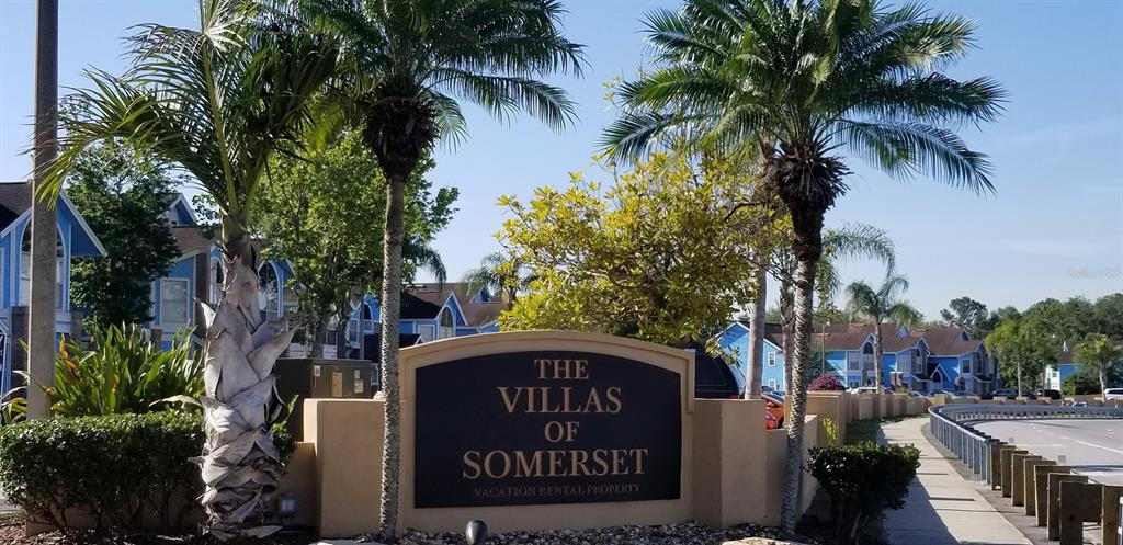 2751 North Poinciana Boulevard, Unit 27 Kissimmee, FL 34746 - Photo 18 of 18 a sign on the side of a road