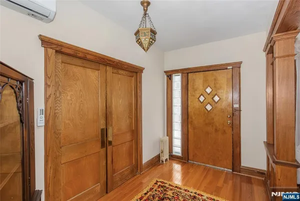 a bathroom with a shower and a sink