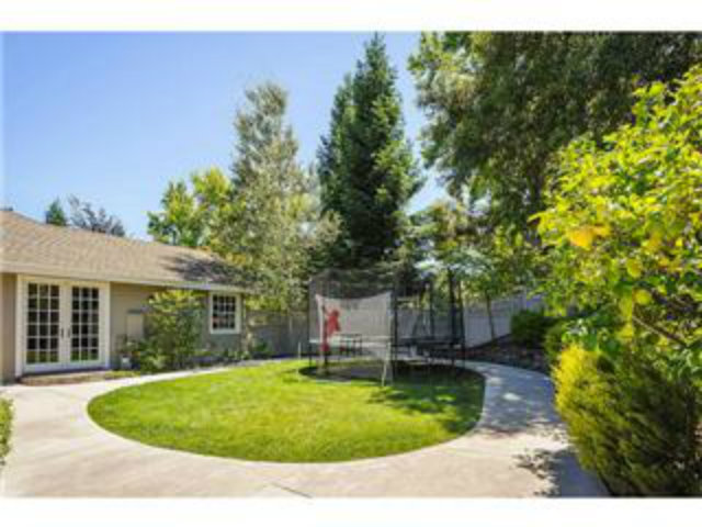 500 Pullman Road Hillsborough, CA 94010 - Photo 18 of 20 a swimming pool with outdoor seating and yard