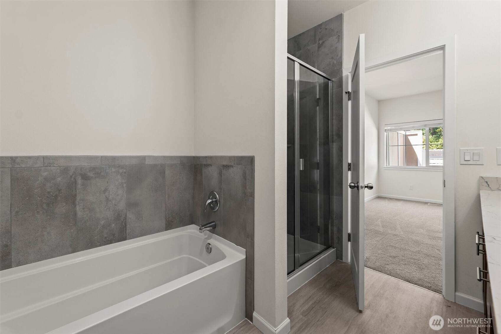 920 East Old Ranch Road, Unit F1F2 Allyn, WA 98524 - Photo 21 of 32 a bathroom with a tub shower and sink