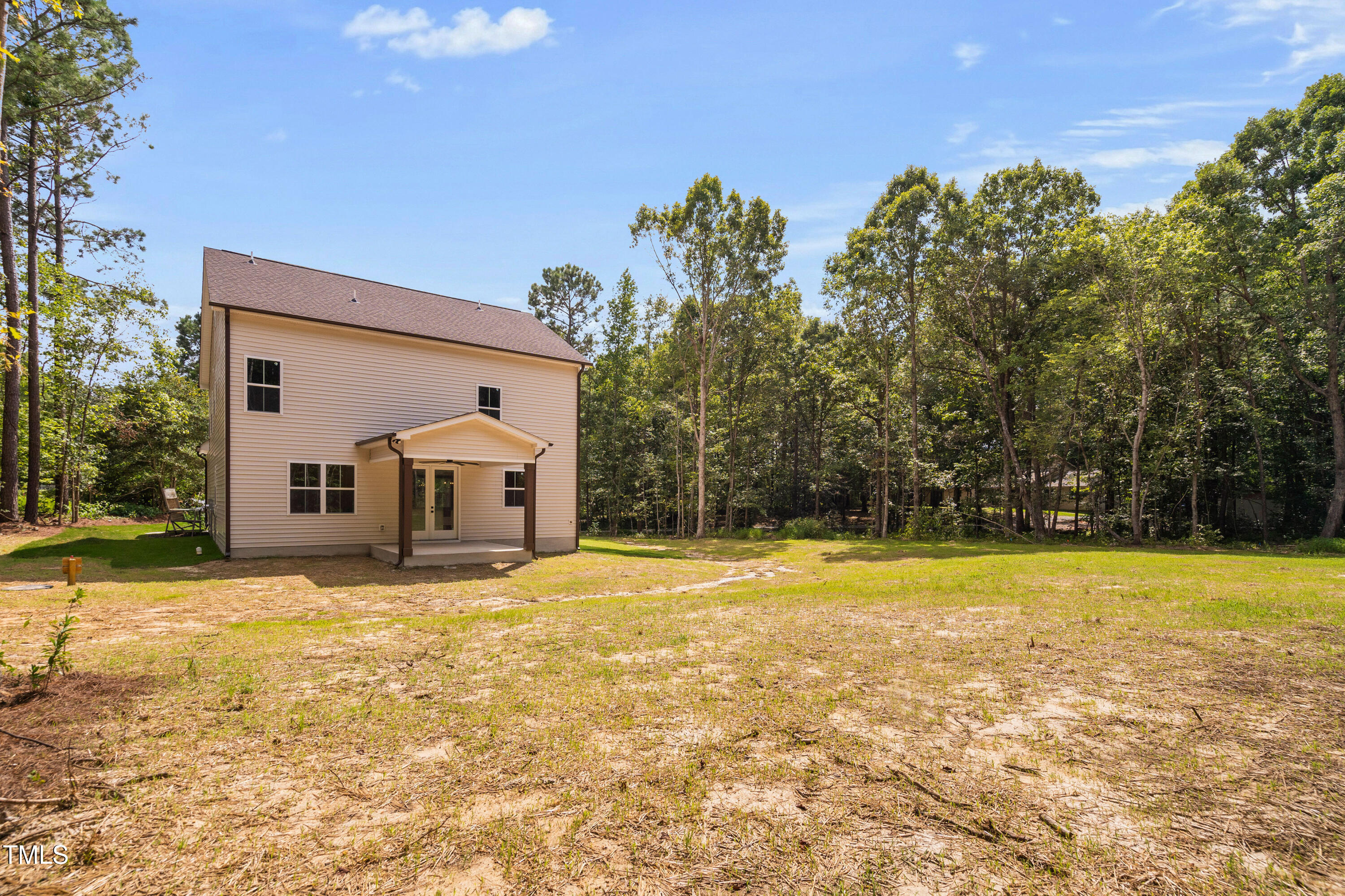 312 Russ Road Smithfield, NC 27577 - Photo 50 of 62 a big house with swimming pool in front of it