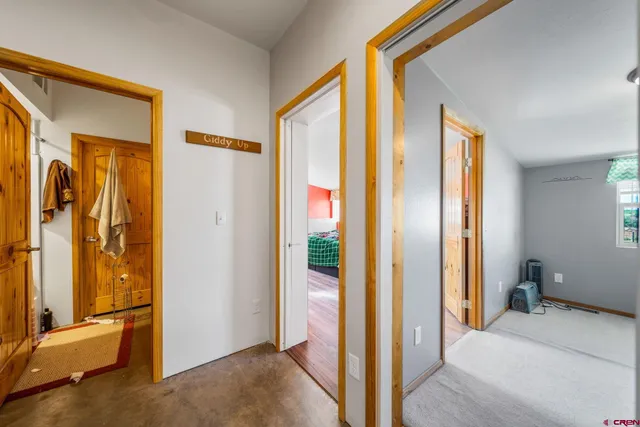 a view of a bathroom with a tub and shower