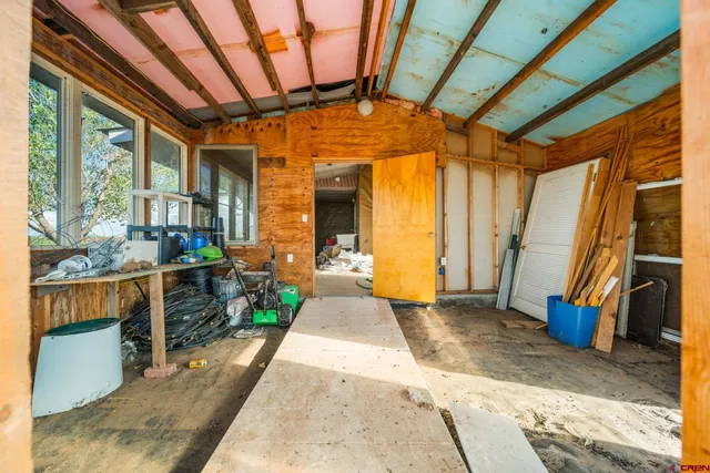 a view of a porch with furniture