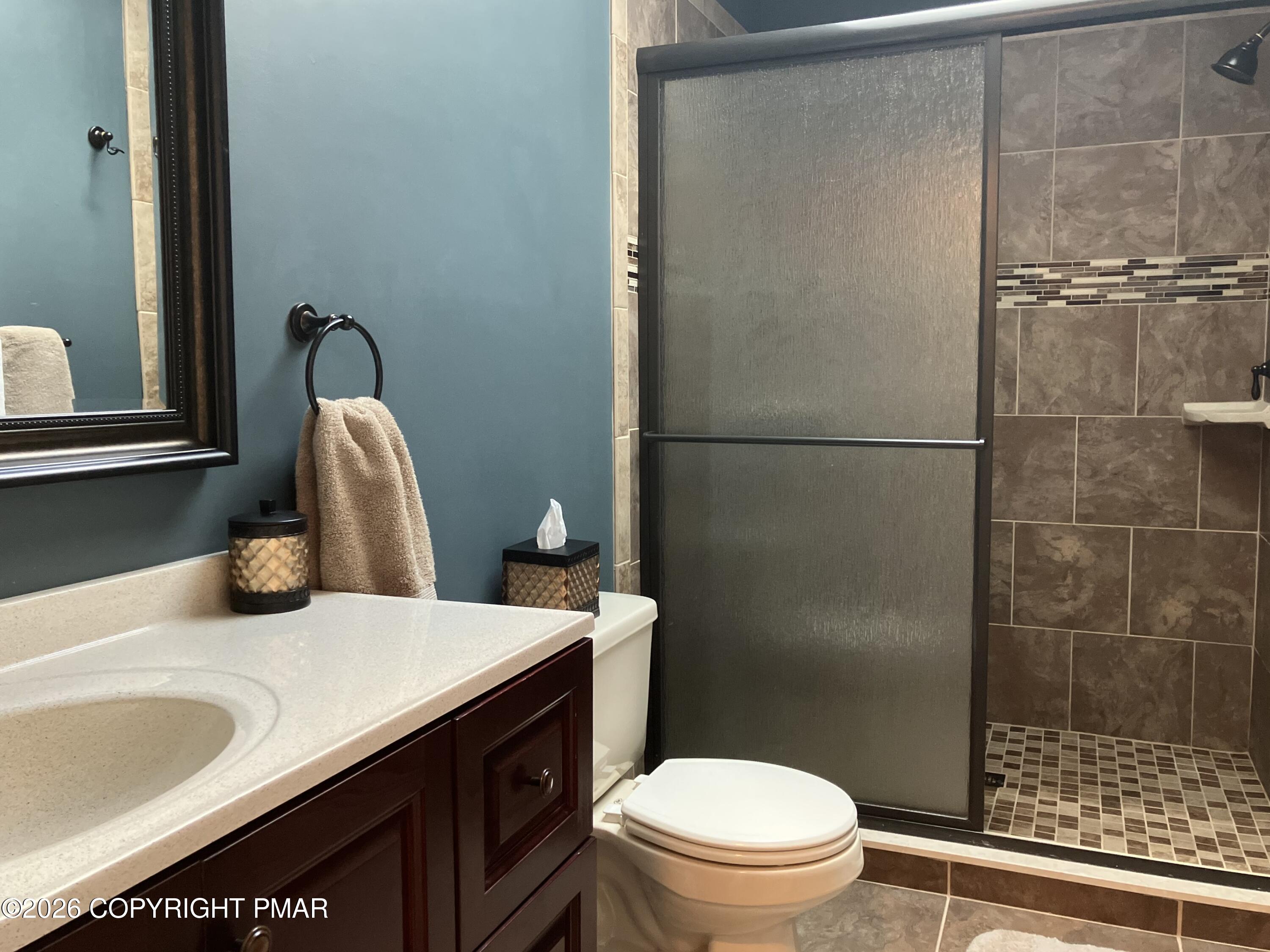 366 Appleseed Road Pocono Pines, PA 18350 - Photo 24 of 32 a bathroom with a sink toilet and shower