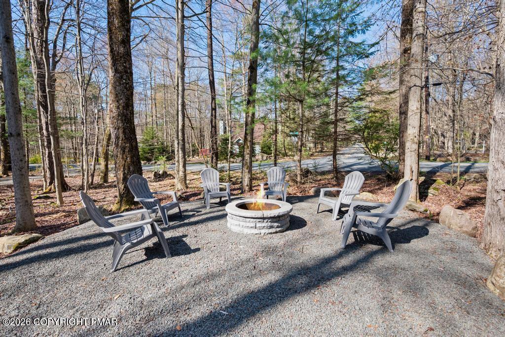 366 Appleseed Road Pocono Pines, PA 18350 - Photo 28 of 32 a view of a patio with chairs and tables