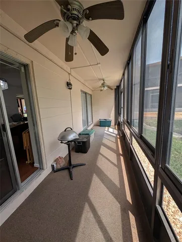 a view of a hallway with a couch