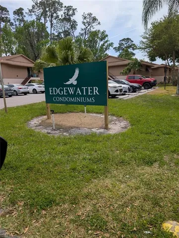 a view of a park with welcome board