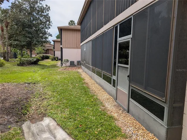 a view of house with front door