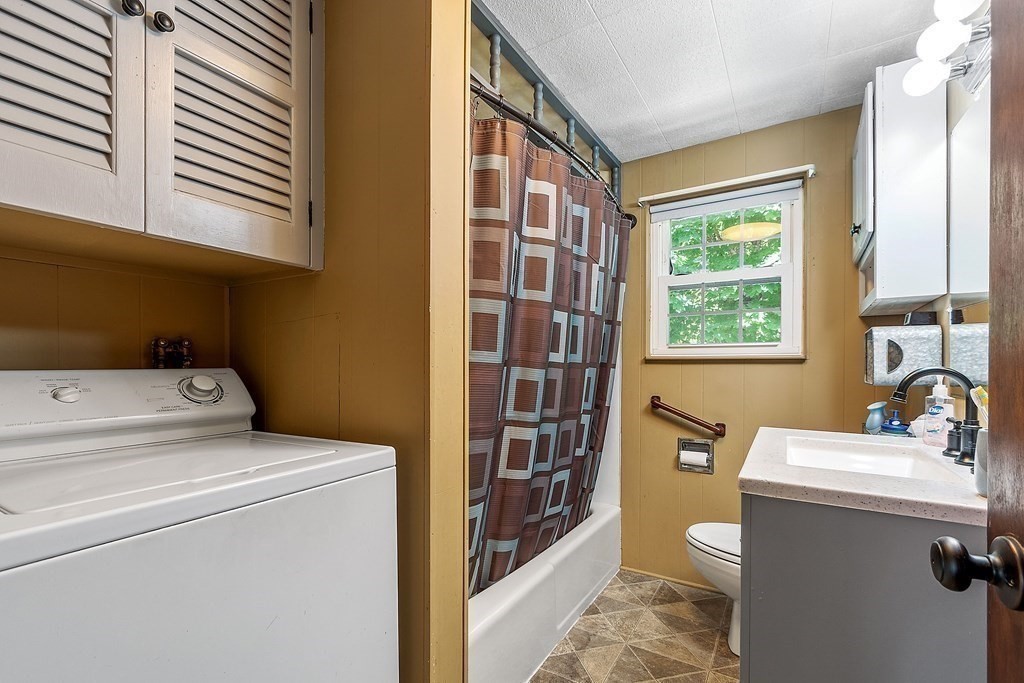 701 Silver Lake Street Athol, MA 01331 - Photo 13 of 34 a bathroom with a sink a toilet and a window
