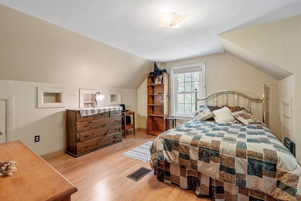 701 Silver Lake Street Athol, MA 01331 - Photo 16 of 34 a bedroom with a bed and dresser