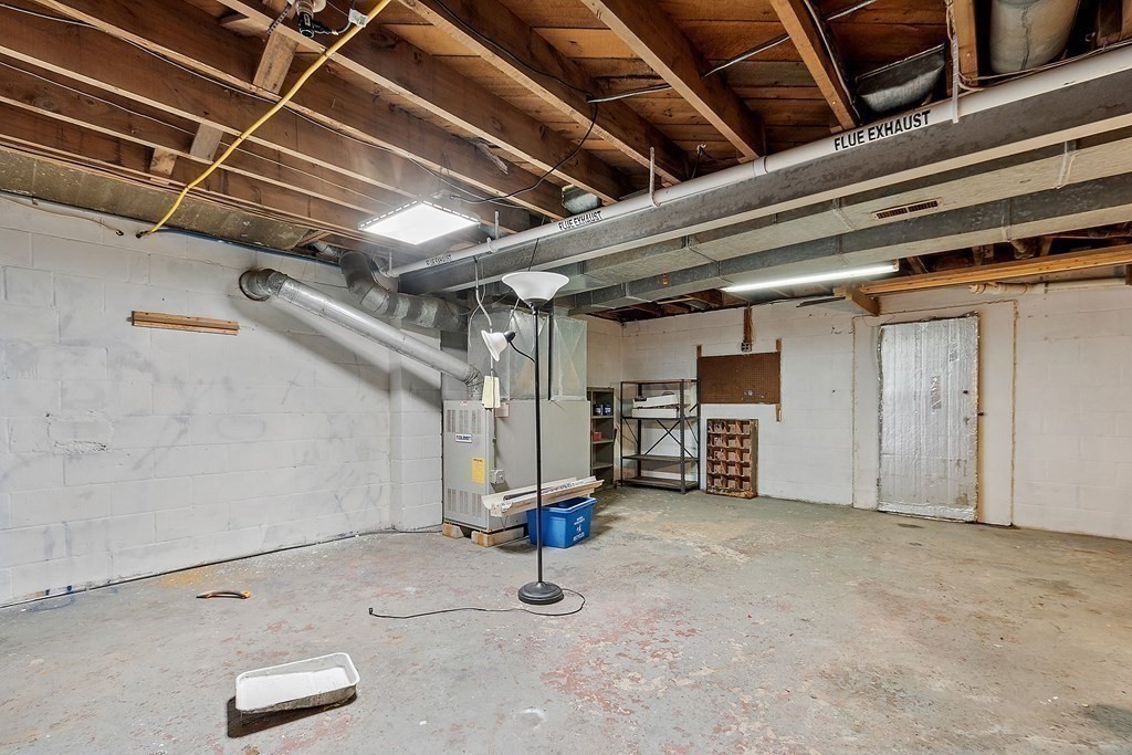 701 Silver Lake Street Athol, MA 01331 - Photo 23 of 34 a view of empty room with air conditioner duct and materials on floor