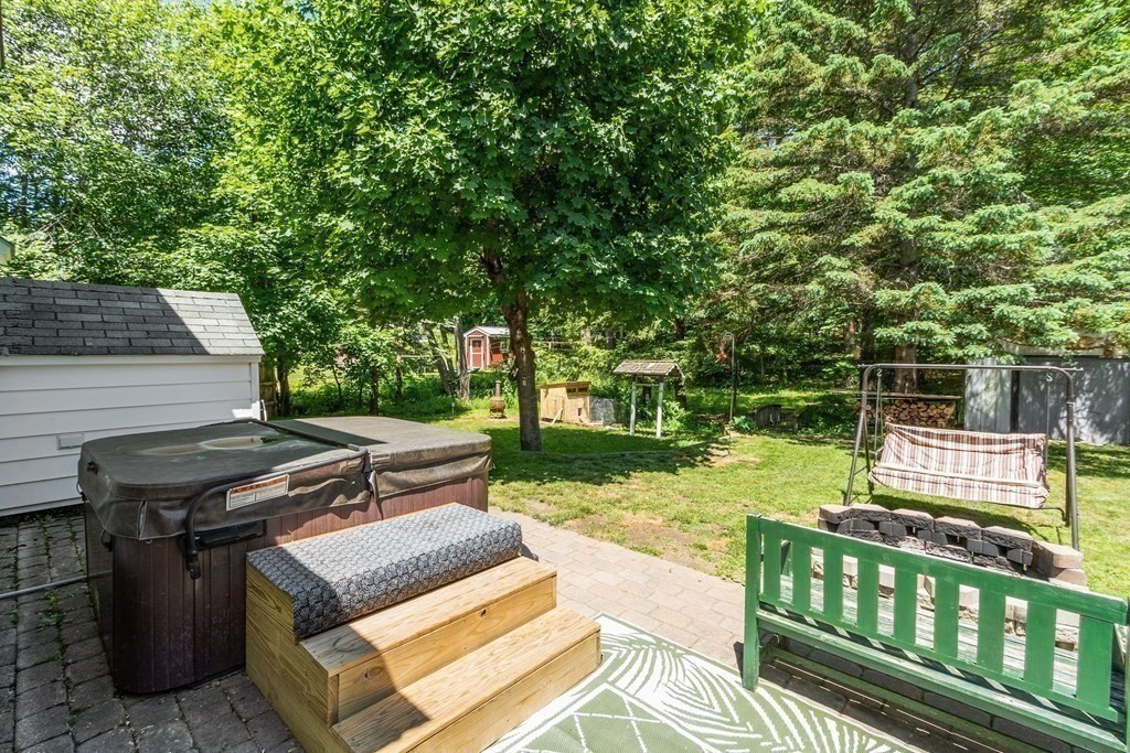 701 Silver Lake Street Athol, MA 01331 - Photo 27 of 34 a view of a wooden deck with chairs and a yard
