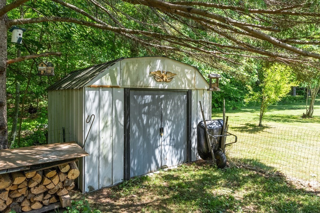 701 Silver Lake Street Athol, MA 01331 - Photo 29 of 34 a backyard of a house with barbeque oven