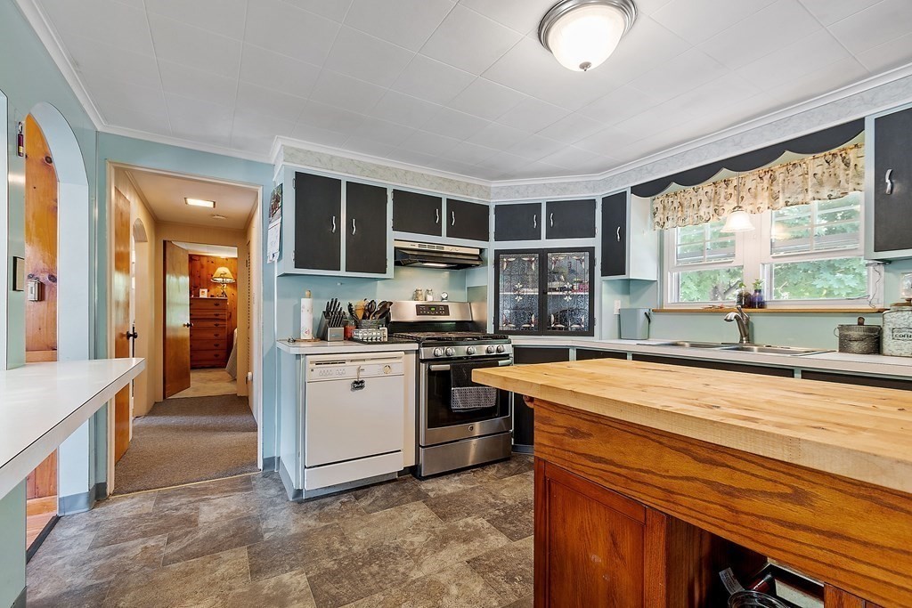 701 Silver Lake Street Athol, MA 01331 - Photo 4 of 34 a kitchen with stainless steel appliances granite countertop a stove and a sink