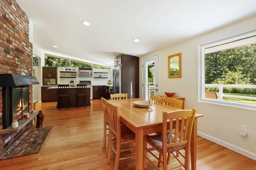 430 Heald Road Carlisle, MA 01741 - Photo 19 of 42 a view of a dining room with furniture window and wooden floor
