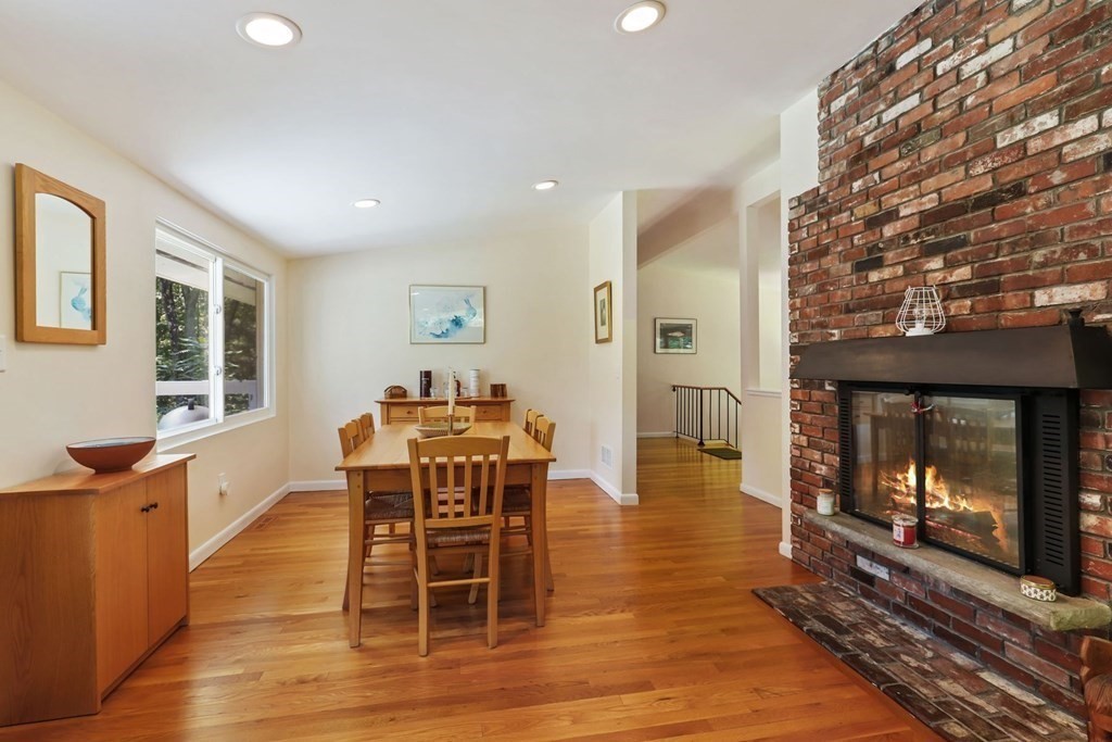 430 Heald Road Carlisle, MA 01741 - Photo 20 of 42 a dining room with furniture window and wooden floor