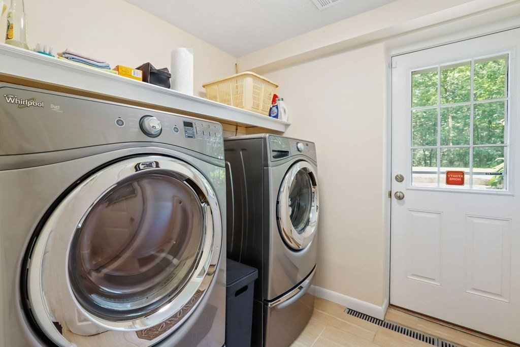 430 Heald Road Carlisle, MA 01741 - Photo 31 of 42 a utility room with dryer and washer