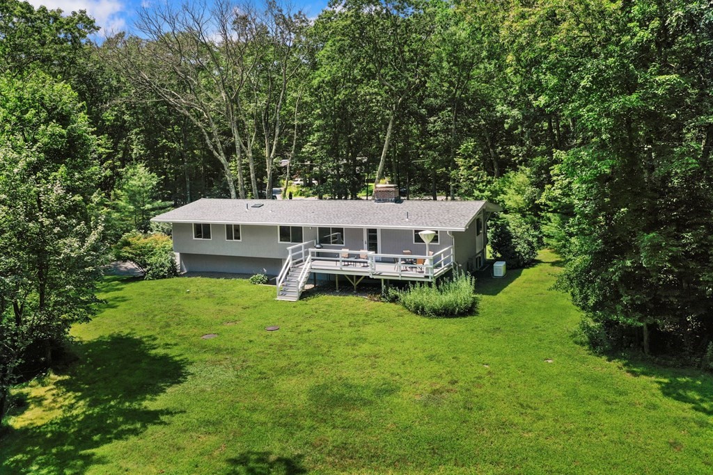 430 Heald Road Carlisle, MA 01741 - Photo 39 of 42 a view of a house with a backyard