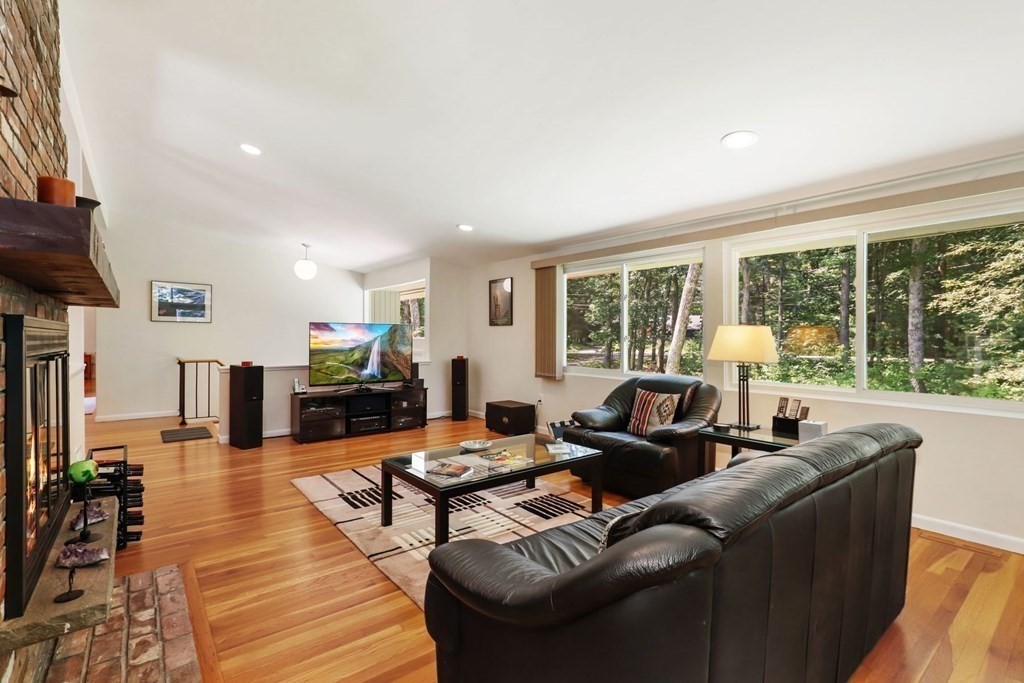 430 Heald Road Carlisle, MA 01741 - Photo 5 of 42 a living room with furniture and large windows