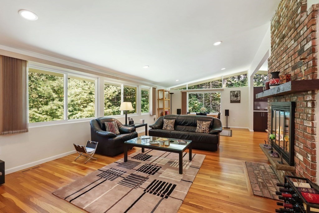 430 Heald Road Carlisle, MA 01741 - Photo 7 of 42 a living room with furniture and a large window