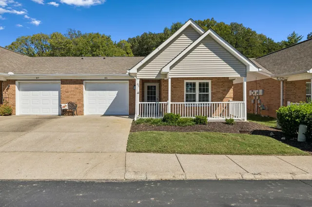front view of a house and a yard