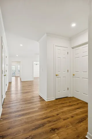 a view of a livingroom with wooden floor