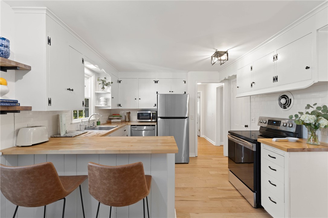 228 Overbrook Road Pittsford, NY 14618 - Photo 15 of 49 Eat In Kitchen with chopping block counters