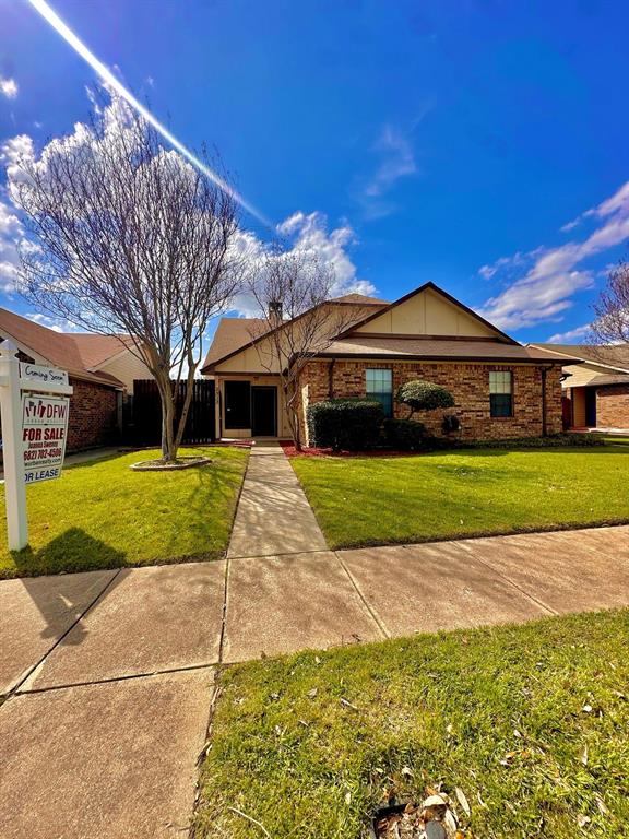 2913 Northrope Street Euless, TX 76039 - Photo 1 of 1 Single story home with brick siding and a front yard