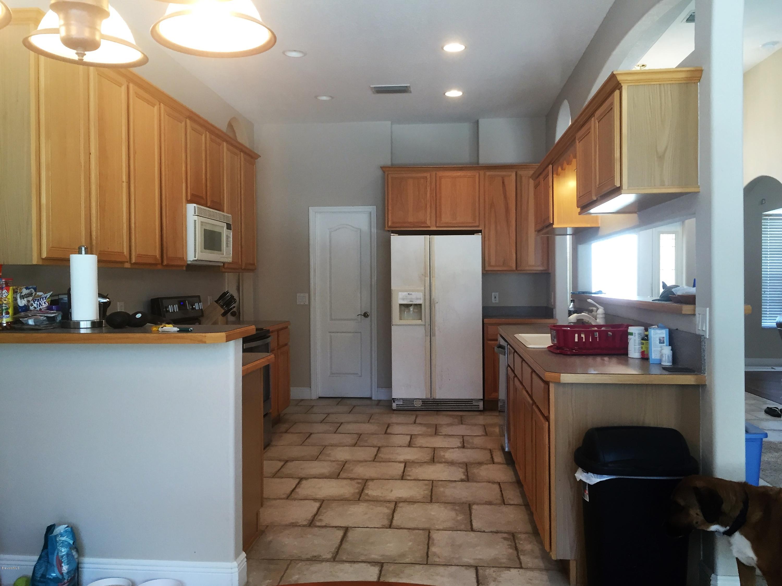 836 Sunswept Road Northeast Palm Bay, FL 32905 - Photo 8 of 19 IMG_1422