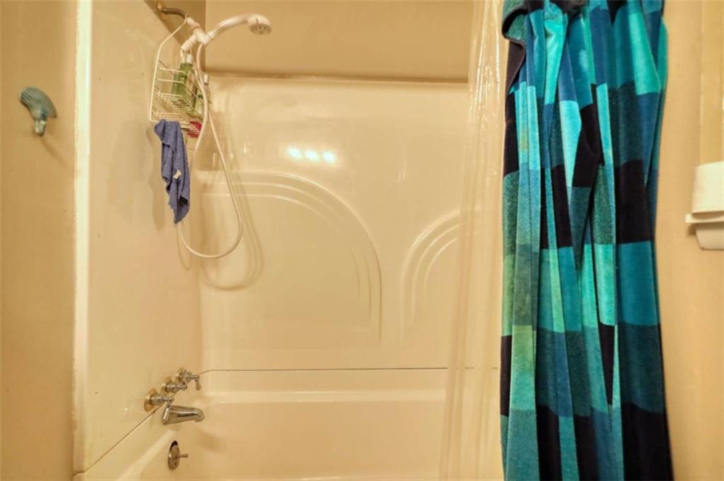 279 Spring Street Winder, GA 30680 - Photo 22 of 43 a bathroom with a shower