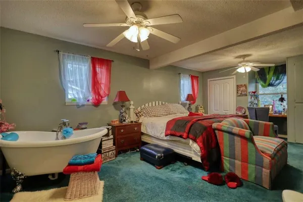 a bathroom with a sink mirror and vanity